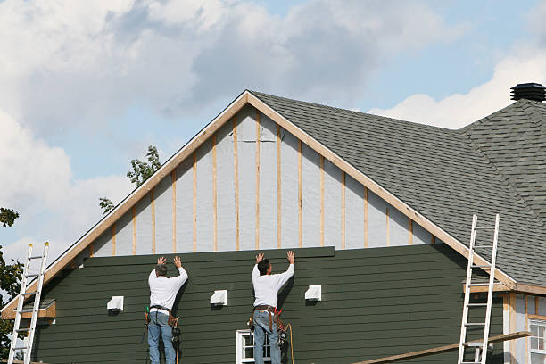 Professional Siding technician working in Georgetown, CO